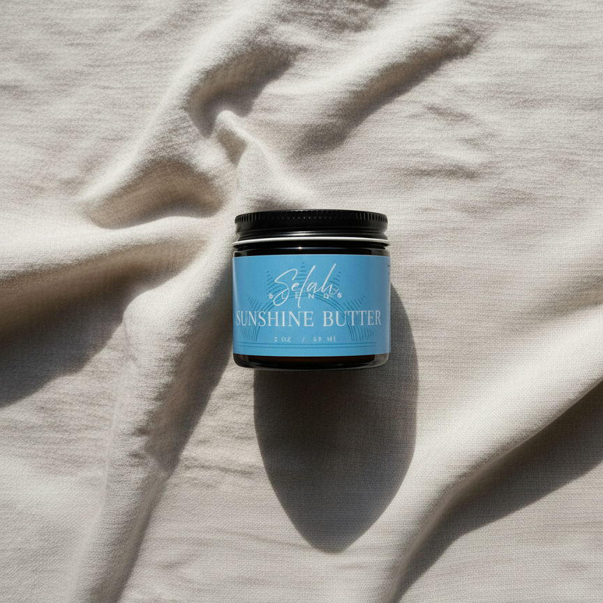 Jar of 'Sunshine Butter' on a textured surface